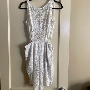 Bebe white lace short romper cutouts